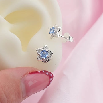 Aretes Flor Chispas 8mm Celeste Plata 925 27665